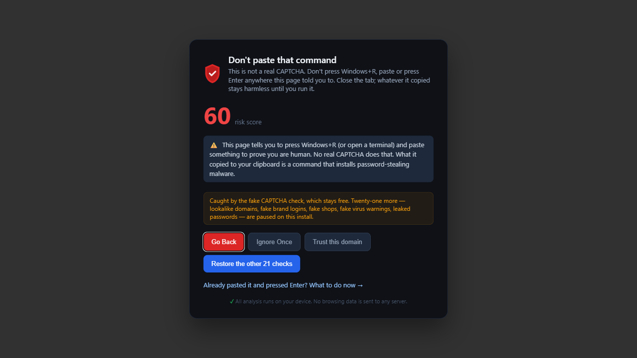 PhishClean warning titled Don't paste that command: this is not a real CAPTCHA; don't press Windows+R, paste or press Enter anywhere this page told you to.